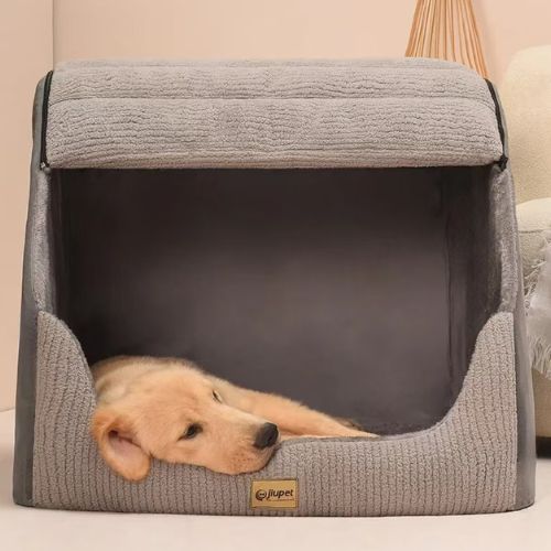 Abri en tissu rembourré servant de NICHE POUR CHIEN XXL avec chien qui se repose à l’intérieur