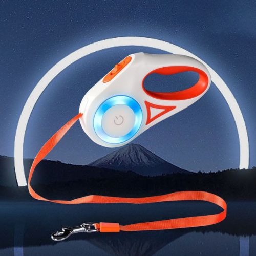 Laisse pour chien moderne couleur orange et blanc, équipée d’une lampe LED sécurisée.