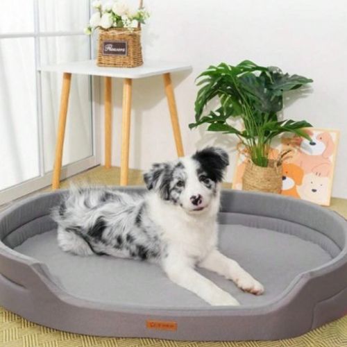 Lit pour chien XXL gris moelleux avec rebords surélevés, idéal pour les grands chiens, design élégant et confortable.