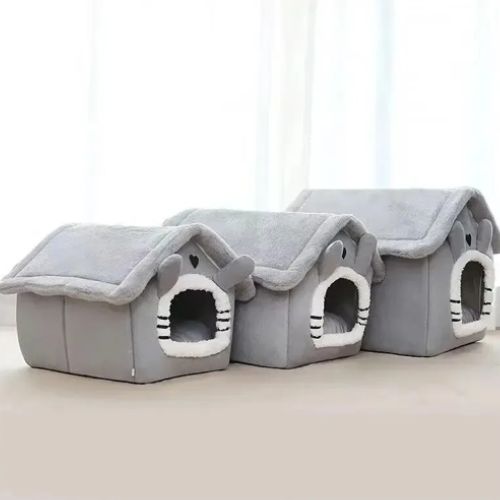 Niche d'intérieur pour chien grise et sécurisante, trois tailles différents, confortable et apaise les chiens anxieux.