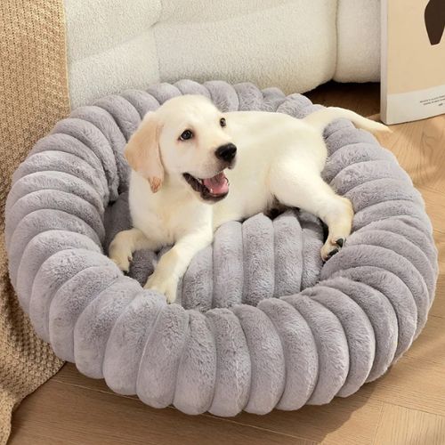 Panier chien apaisant gris avec rebords rembourrés, parfait pour un sommeil profond et anti-stress.