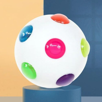 balle lumineuse pour chien blanche avec dômes LED multicolores activés par choc