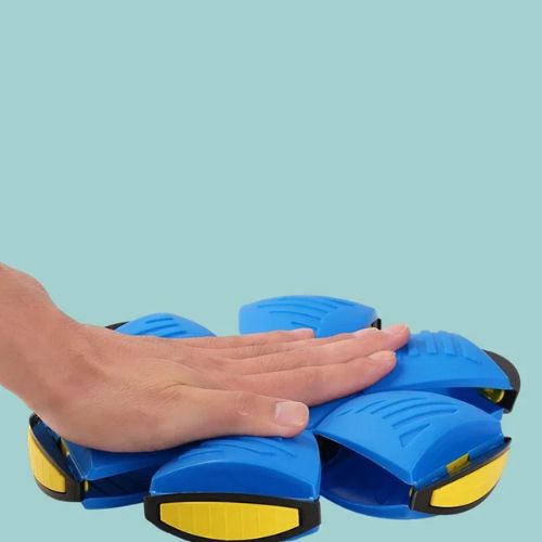 Balle pour chien plate magique Frisballe bleue se transformant en disque sous la pression d'une main